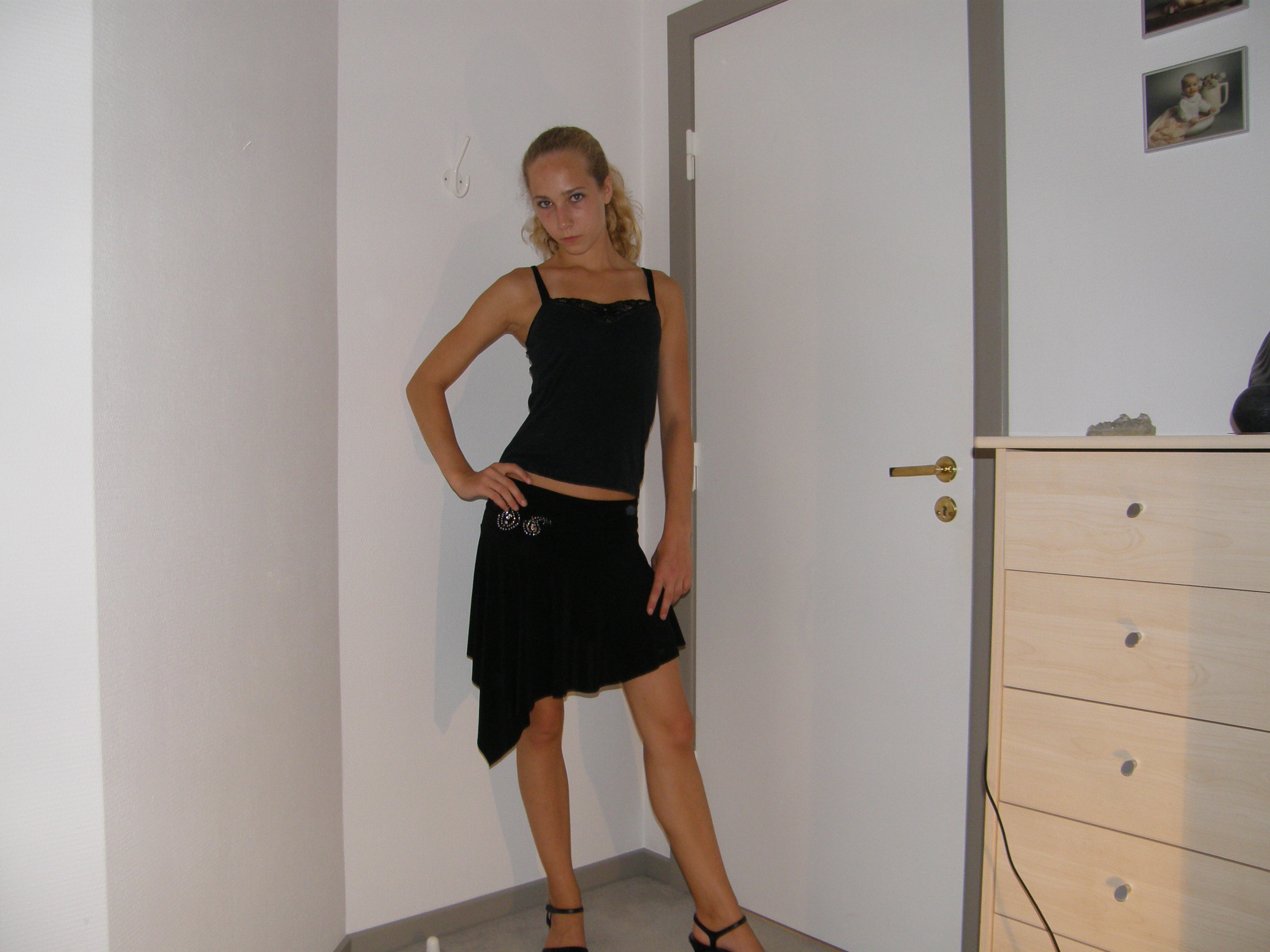 A girl posing in a room